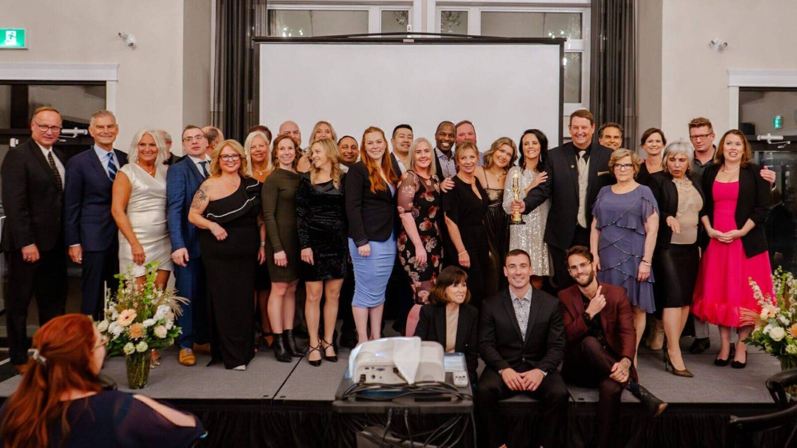 CENTURY 21 Fusion agents and staff at an awards night